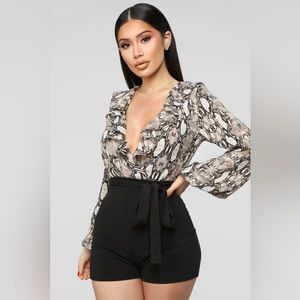 Talk Behind her Back Romper 🖤